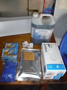 Donated HIV test kits, syringes, bandages, gloves and cleaner 